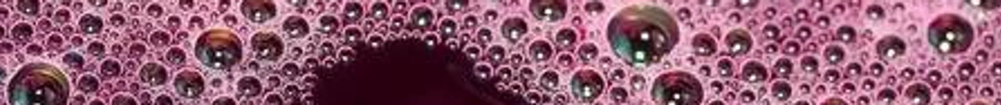 70732535-bubbles-on-a-red-wine-in-the-pr